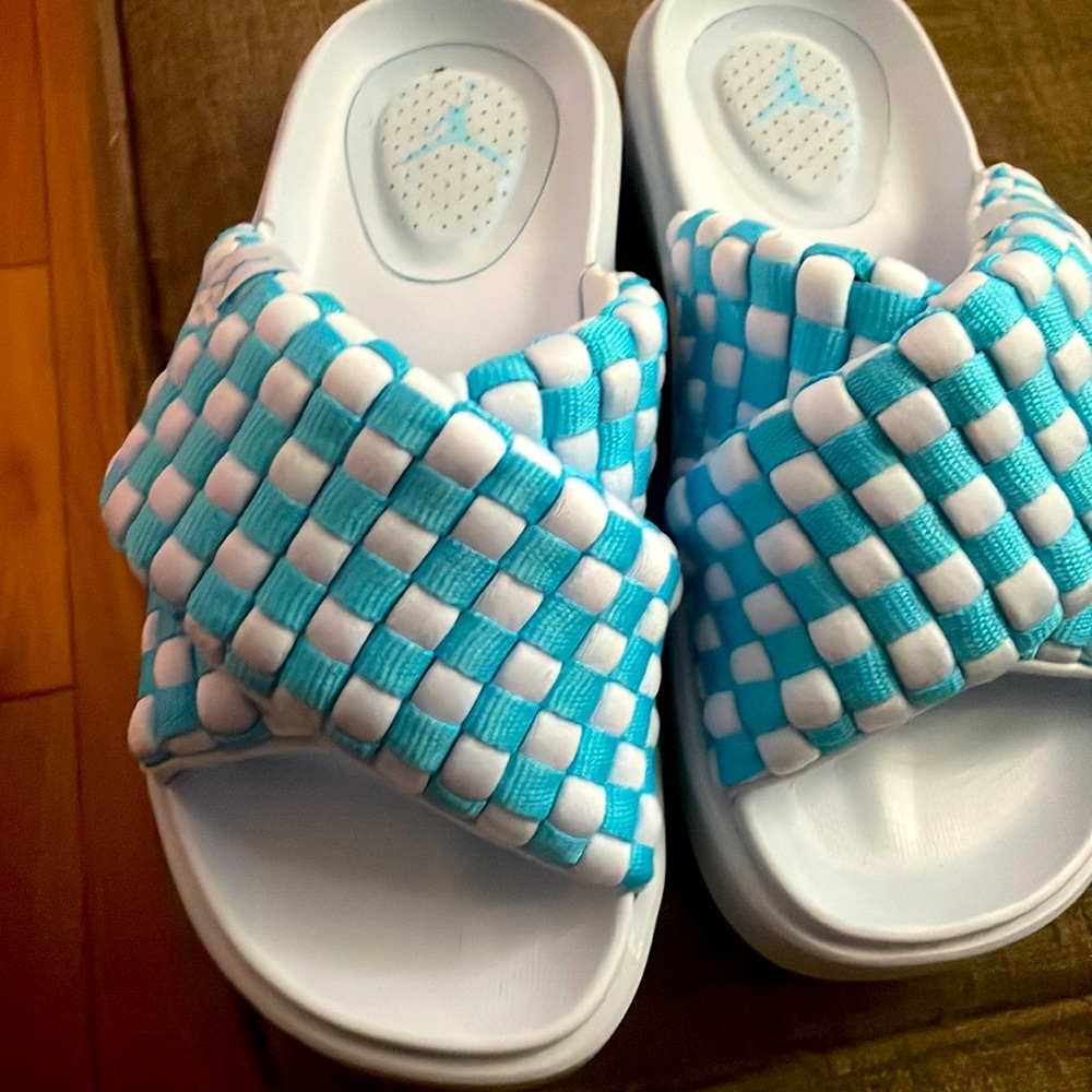 Womens Jordan slides size 8.  Runs a tad big
